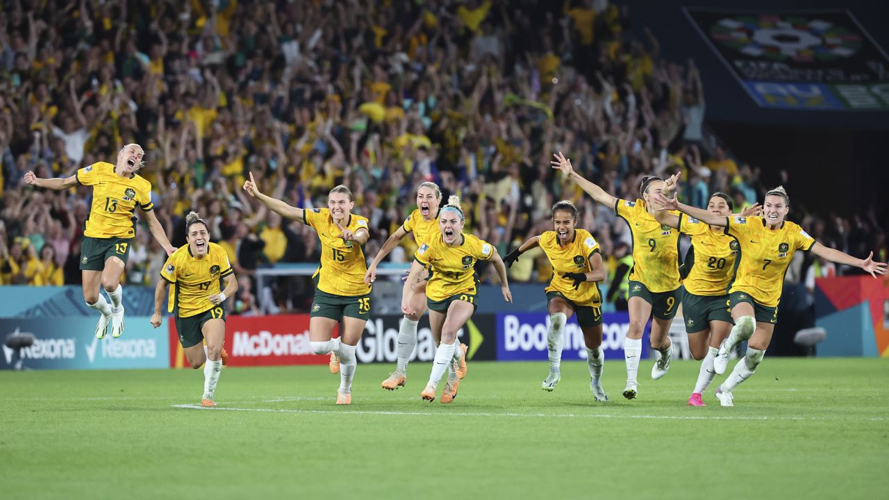 Australia players celebrate after beating France.