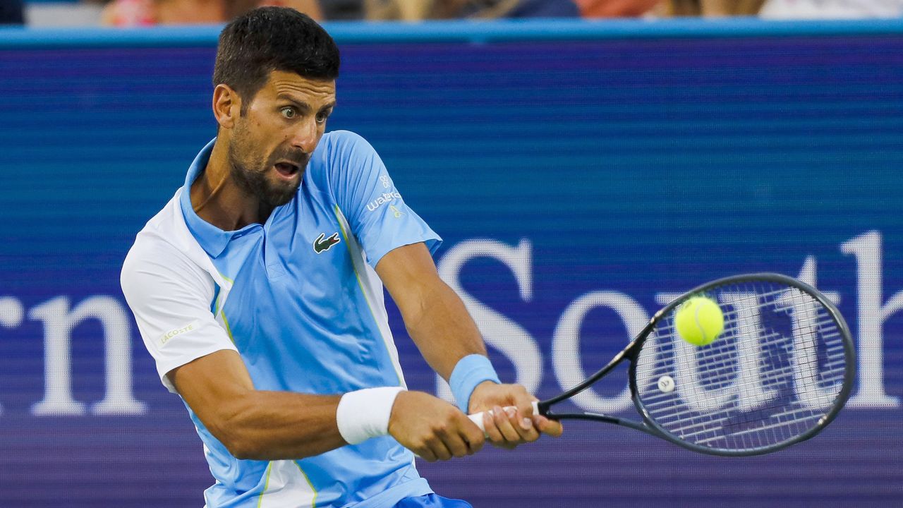 Aug 16, 2023; Mason, OH, USA; Novak Djokovic (SRB) returns a shot against Alejandro Davidovich Fokina (ESP) during the Western and Southern Open tennis tournament at Lindner Family Tennis Center. Mandatory Credit: Katie Stratman-USA TODAY Sports