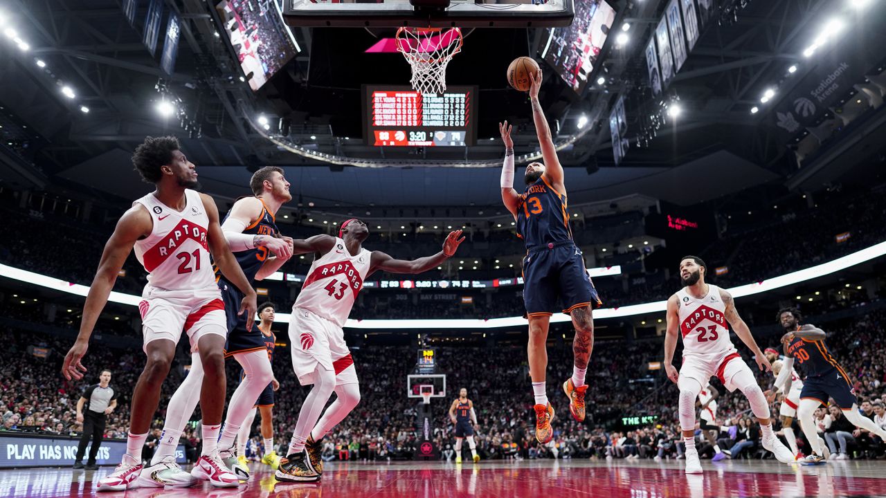 TORONTO, ON - JANUARY 22: Evan Fournier #13 of the New York Knicks goes to the basket against the Toronto Raptors during the second half of their basketball game at the Scotiabank Arena on January 22, 2023 in Toronto, Ontario, Canada. NOTE TO USER: User expressly acknowledges and agrees that, by downloading and/or using this Photograph, user is consenting to the terms and conditions of the Getty Images License Agreement. (Photo by Mark Blinch/Getty Images)