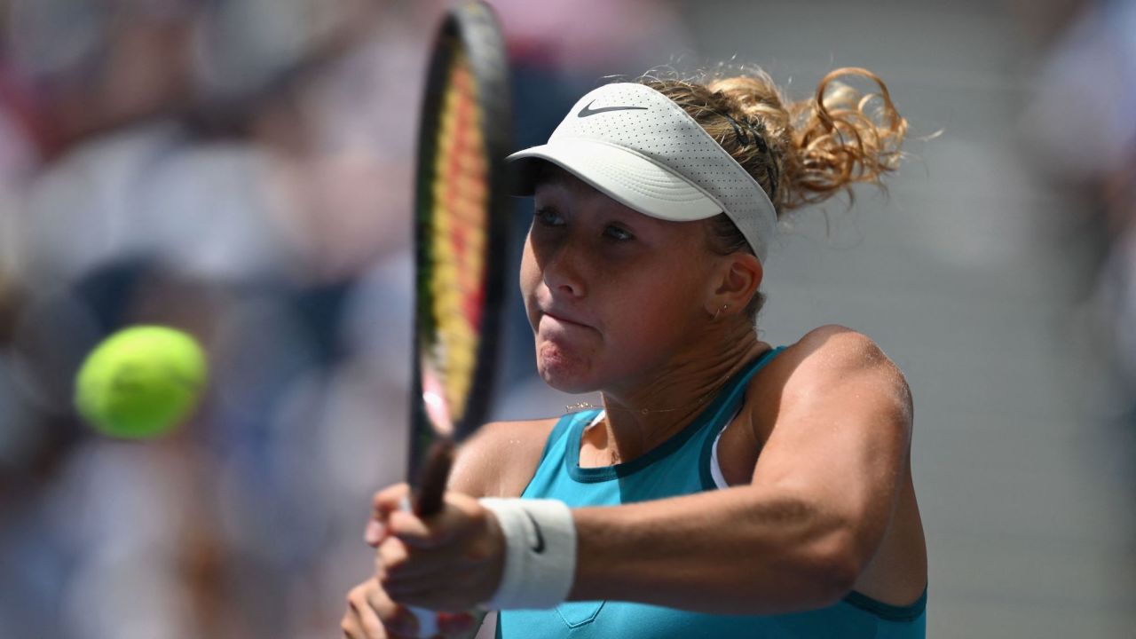 Russia's Mirra Andreeva hits a return to USA's Coco Gauff during the US Open tennis tournament women's singles second round match at the USTA Billie Jean King National Tennis Center in New York City, on August 30, 2023. (Photo by ANGELA WEISS / AFP) (Photo by ANGELA WEISS/AFP via Getty Images)