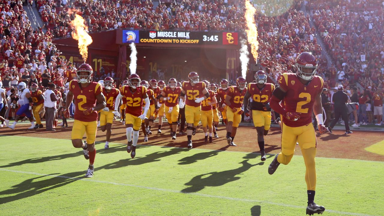 LOS ANGELES, CALIFORNIA - AUGUST 26: The USC Trojans run onto the field prior to the game against the San Jose State Spartans at United Airlines Field at the Los Angeles Memorial Coliseum on August 26, 2023 in Los Angeles, California. (Photo by Katelyn Mulcahy/Getty Images)