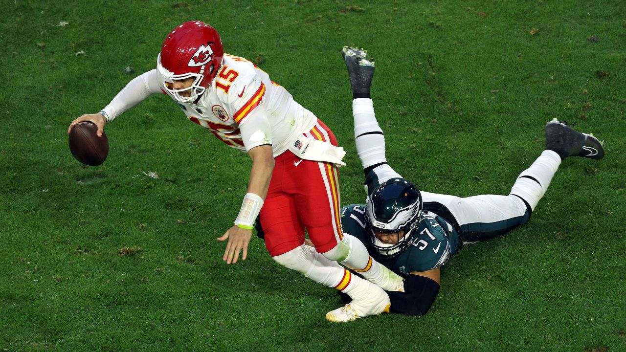 GLENDALE, ARIZONA - FEBRUARY 12: T.J. Edwards #57 of the Philadelphia Eagles tackles Patrick Mahomes #15 of the Kansas City Chiefs during the second quarter in Super Bowl LVII at State Farm Stadium on February 12, 2023 in Glendale, Arizona. (Photo by Rob Carr/Getty Images)