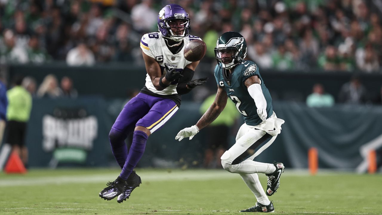 PHILADELPHIA, PENNSYLVANIA - SEPTEMBER 14: Justin Jefferson #18 of the Minnesota Vikings completes a pass against Darius Slay #2 of the Philadelphia Eagles during an NFL football game between the Philadelphia Eagles and the Minnesota Vikings at Lincoln Financial Field on September 14, 2023 in Philadelphia, Pennsylvania. (Photo by Michael Owens/Getty Images)