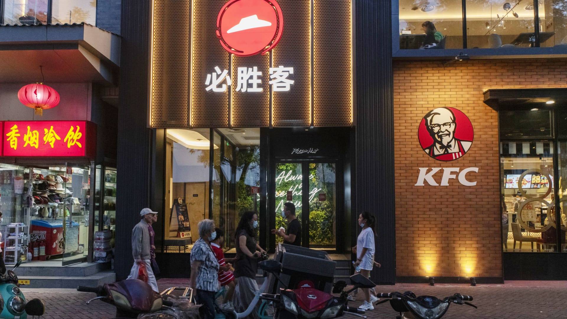 Yum China says tech investments let it open more stores without needing more staff