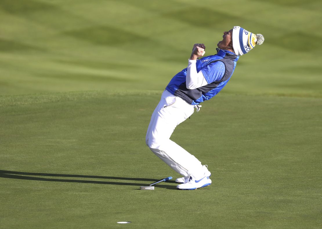 Swedish golfer Suzann Pettersen celebrates after sinking a putt to win the Solheim Cup for Europe on Sunday, September 15.