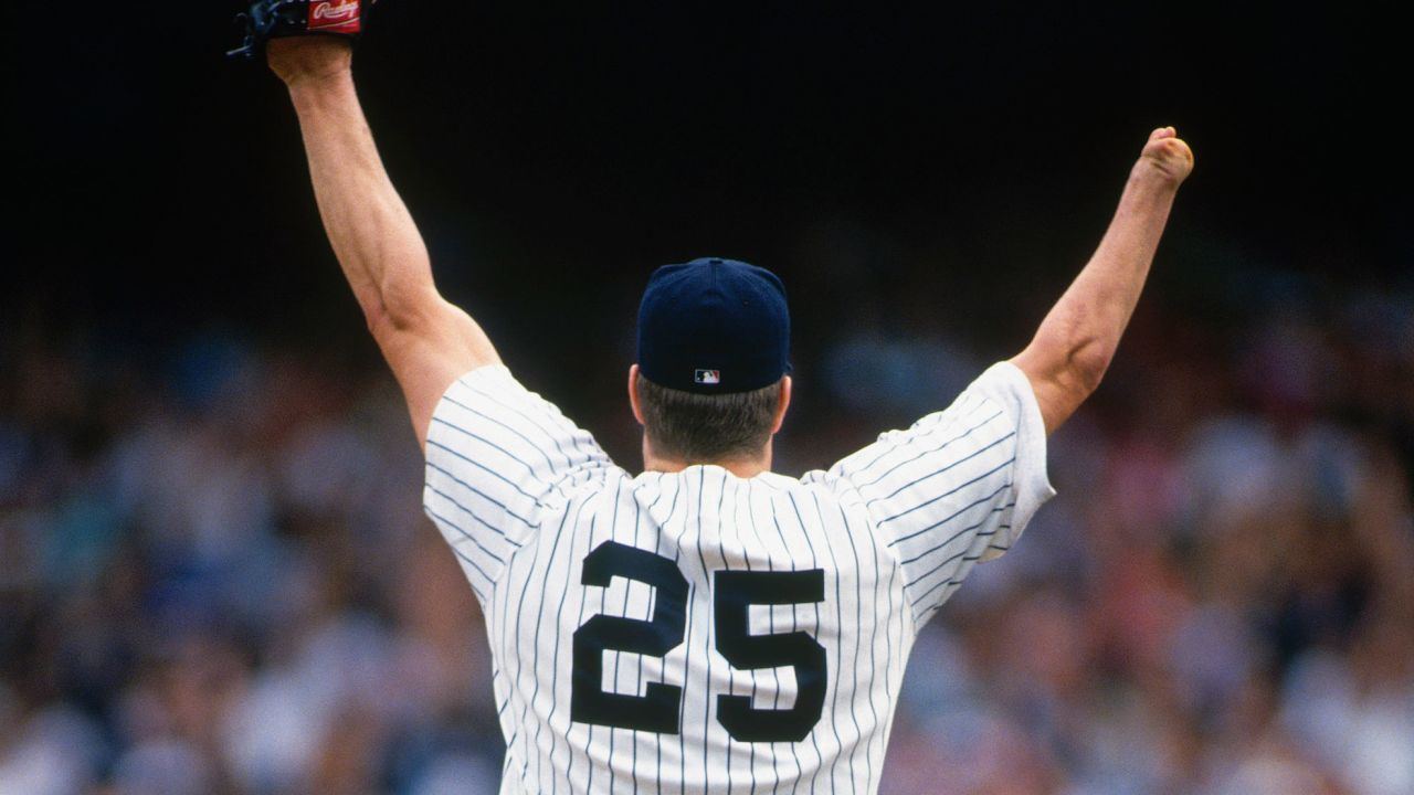 BRONX, NY - SEPTEMBER 4:  Jim Abbott #25, pitcher for the New York Yankees, raises his arms in celebration after pitching a no hitter against the Cleveland Indians at Yankee Stadium on September 4, 1993 in Bronx, New York. (Photo by Focus on Sport via Getty Images)