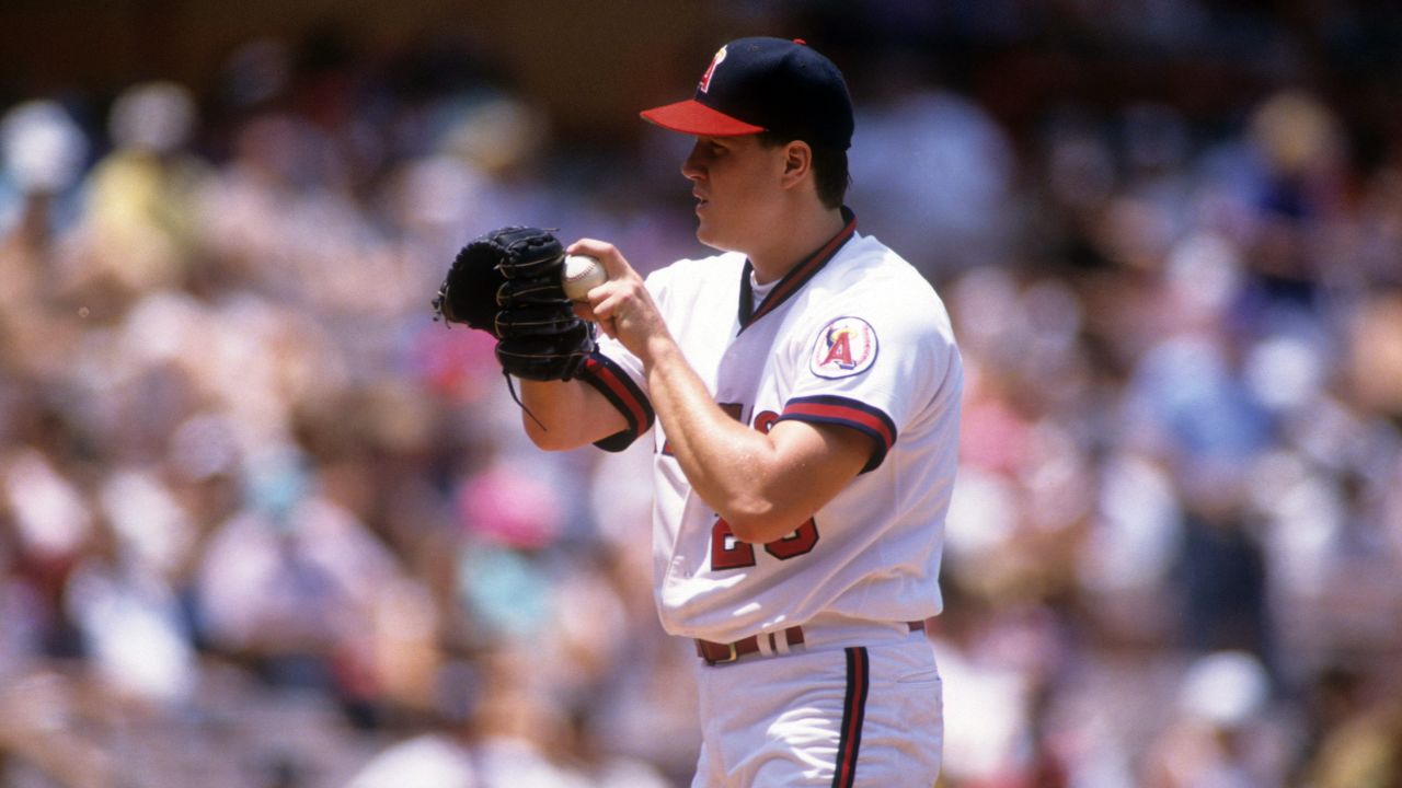 ANAHEIM, CA - MAY 31:  Pitcher Jim Abbott #25 of the California Angels readies to throw a pitch during an MLB game against the Cleveland Indians on May 31, 1992 at Anaheim Stadium in Anaheim, California.  (Photo by Stephen Dunn/Getty Images)