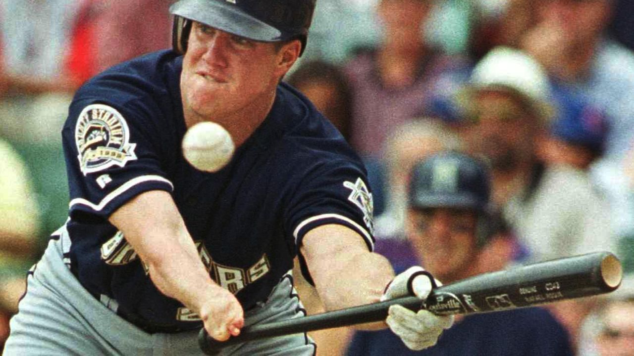 CHICAGO, UNITED STATES:  Milwaukee Brewers starting pitcher Jim Abbott bunts for a single in the third inning against the Chicago Cubs 30 June, 1999 at Wrigley Field in Chicago, Illinois. Abbott also hit a two-run single in the fourth inning of the Brewers' 5-4 loss to the Cubs.   AFP PHOTO/John ZICH (Photo credit should read JOHN ZICH/AFP via Getty Images)