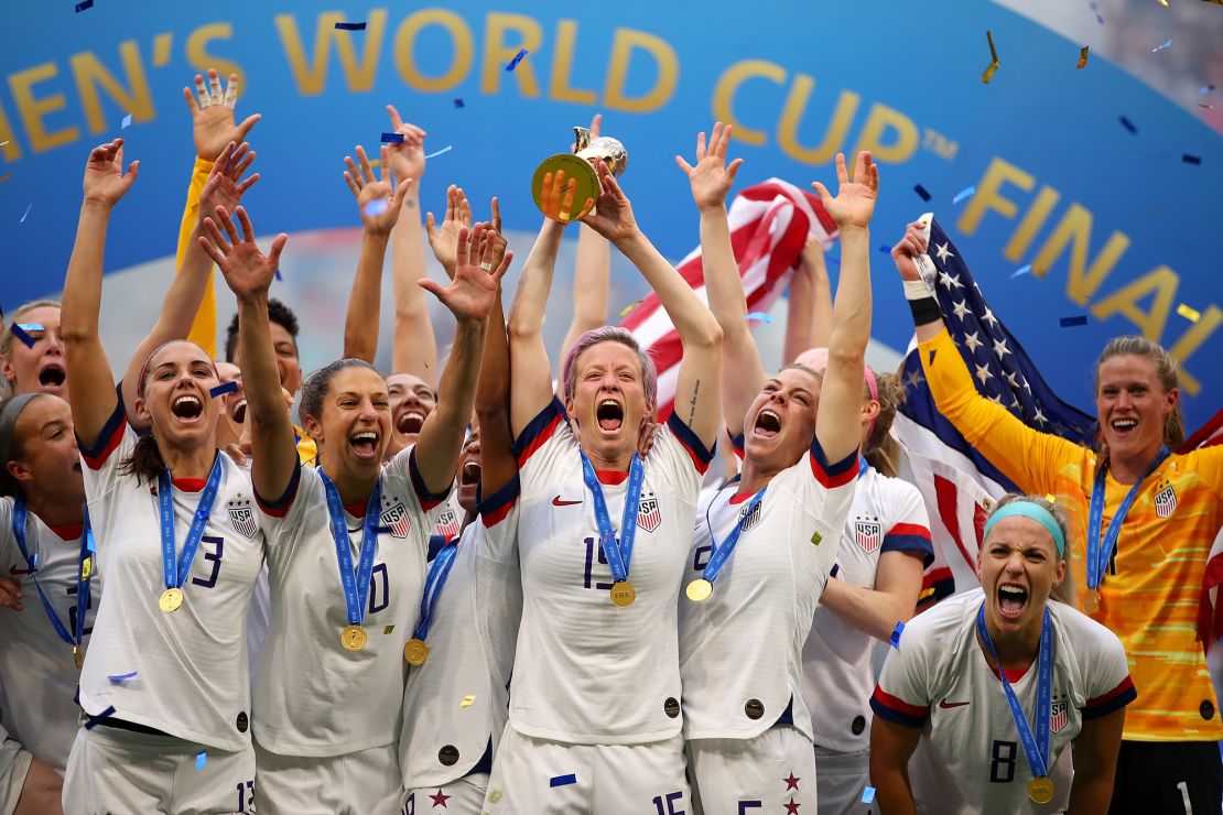 LYON, FRANCE - JULY 07: Megan Rapinoe of the USA lifts the trophy as USA celebrate victory during the 2019 FIFA Women's World Cup France Final match between The United State of America and The Netherlands at Stade de Lyon on July 07, 2019 in Lyon, France. (Photo by Richard Heathcote/Getty Images)