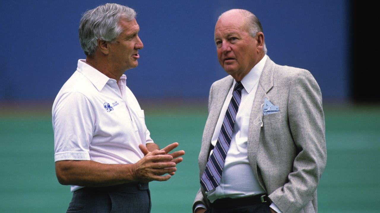 Then Cowboys Vice President of Player Personnel Brandt (L) and President and General Manager Tex Schramm talking before a game against the Pittsburgh Steelers on September 4, 1988.