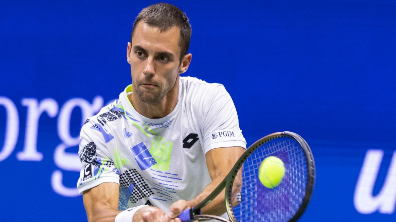 Serbia's Laslo Djere returns the ball to Serbia's Novak Djokovic during the US Open tennis tournament men's singles third round match at the USTA Billie Jean King National Tennis Center in New York City, on September 1, 2023.