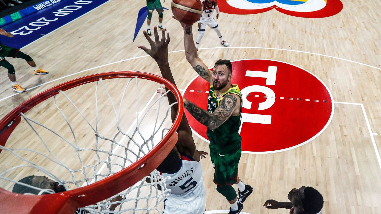 Donatas Motiejunas #20 of Lithuania shoots the ball against Mikal Bridges #5 of the United States in the second half during the FIBA Basketball World Cup 2nd Round Group J game at Mall of Asia Arena in Manila, Philippines on September 03, 2023.