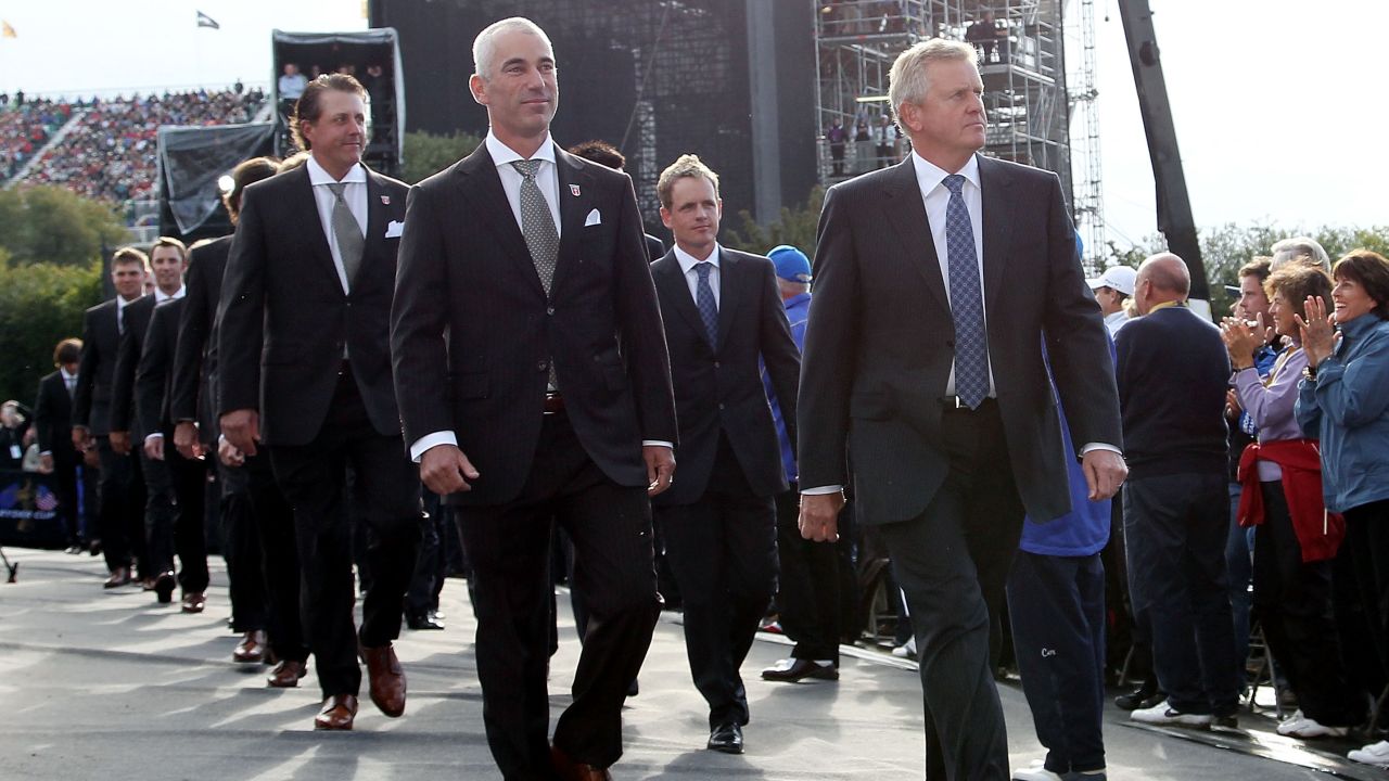 Team Captains Corey Pavin (L) of the USA and Colin Montgomerie of Europe lead out their players during the Opening Ceremony prior to the 2010 Ryder Cup at the Celtic Manor Resort on September 30, 2010 in Newport, Wales.