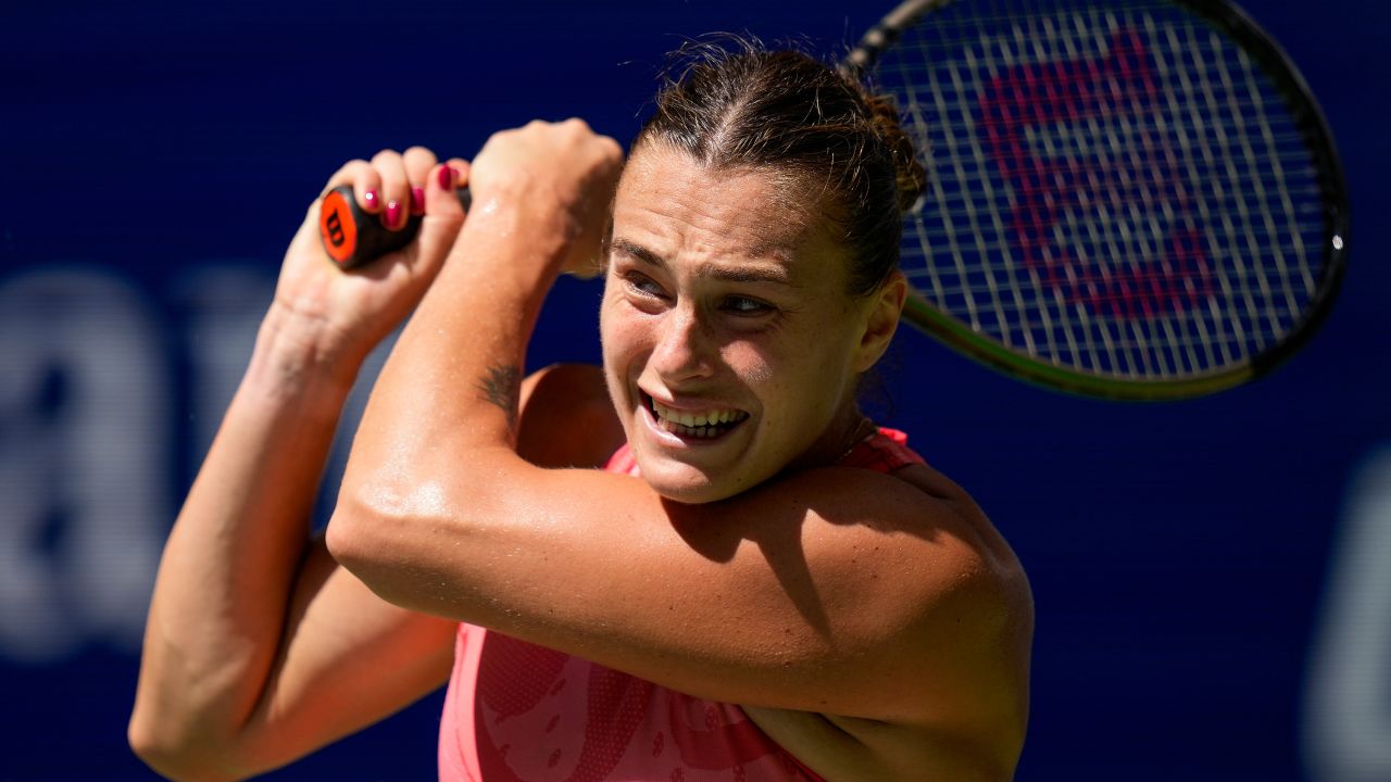 Sabalenka returns a shot to Zheng at the US Open on her way to victory.