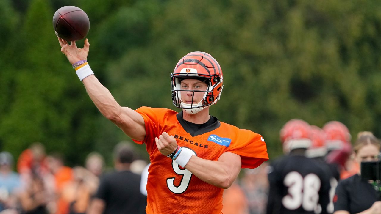 CINCINNATI, OHIO - JULY 26: Joe Burrow #9 of the Cincinnati Bengals participates in a drill during training camp at Kettering Health Practice Fields on July 26, 2023 in Cincinnati, Ohio. (Photo by Dylan Buell/Getty Images)