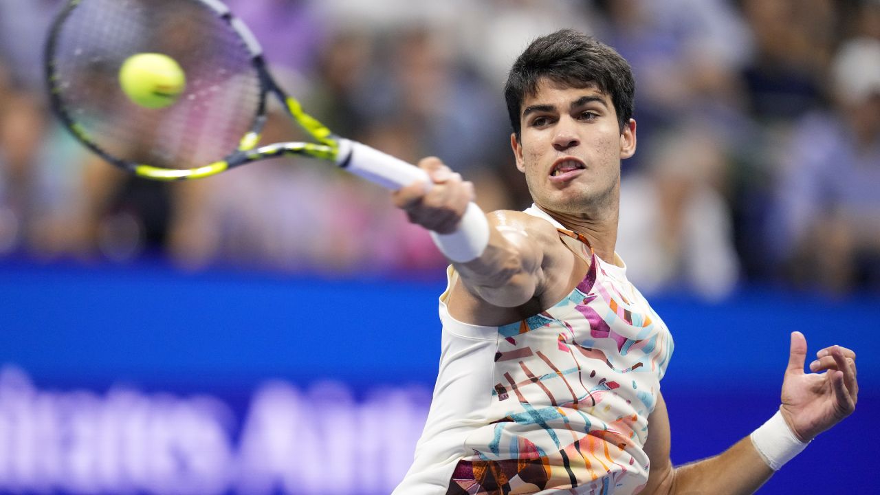 Carlos Alcaraz, of Spain, returns a shot to Daniil Medvedev, of Russia, during the men's singles semifinals of the U.S. Open tennis championships, Friday, Sept. 8, 2023, in New York. (AP Photo/Manu Fernandez)