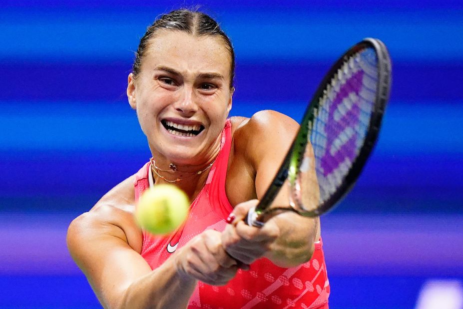 Sabalenka returns a shot to Gauff.