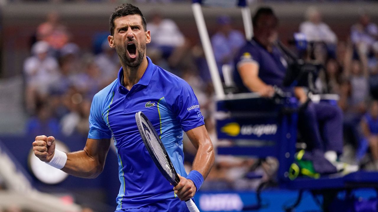 Novak Djokovic, of Serbia, reacts after winning a game in the second set against Daniil Medvedev, of Russia.