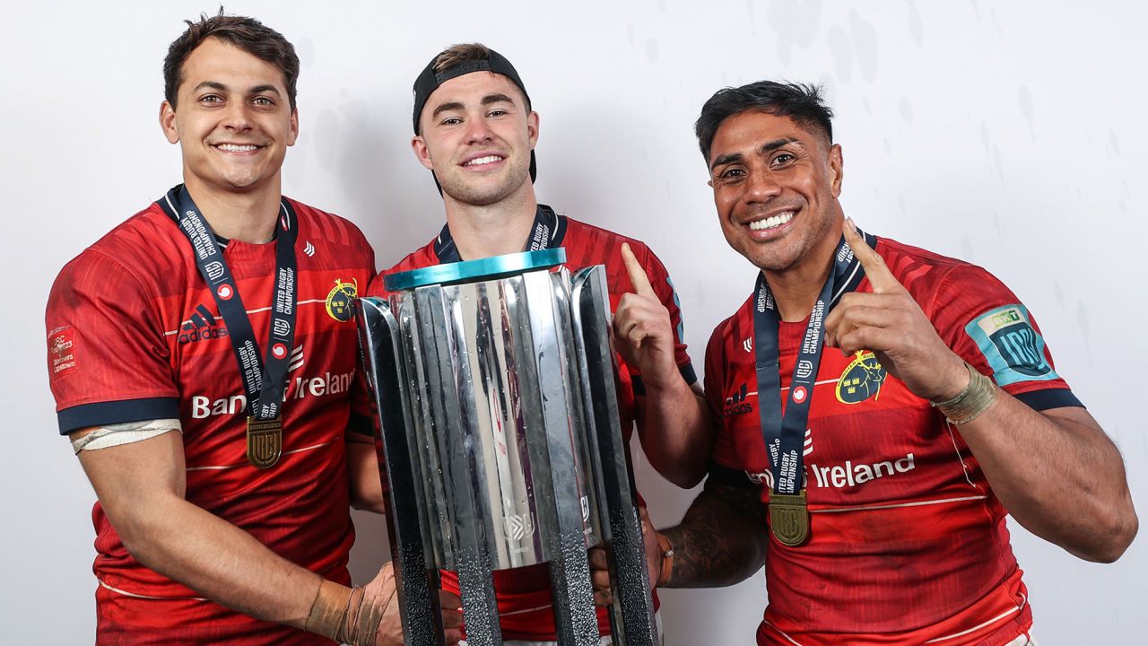 Mandatory Credit: Photo by James Crombie/INPHO/Shutterstock (13935734ek)
DHL Stormers vs Munster. Munster's Antoine Frisch, Jack Crowley and Malakai Fekitoa celebrates with the URC Trophy
BKT United Rugby Championship Final, DHL Stadium, Cape Town, South Africa - 27 May 2023