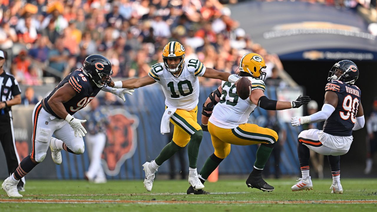 CHICAGO, ILLINOIS - SEPTEMBER 10:  Jordan Love #10 of the Green Bay Packers looks to pass against the Los Angeles Rams at Soldier Field on September 10, 2023 in Chicago, Illinois. (Photo by Quinn Harris/Getty Images)