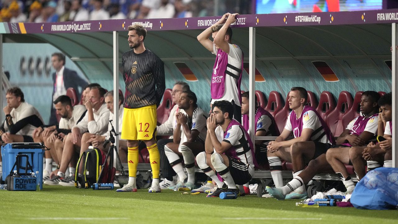 Germany's players look from the bench during the World Cup group E soccer match between Germany and Japan, at the Khalifa International Stadium in Doha, Qatar, Wednesday, Nov. 23, 2022. (AP Photo/Matthias Schrader)