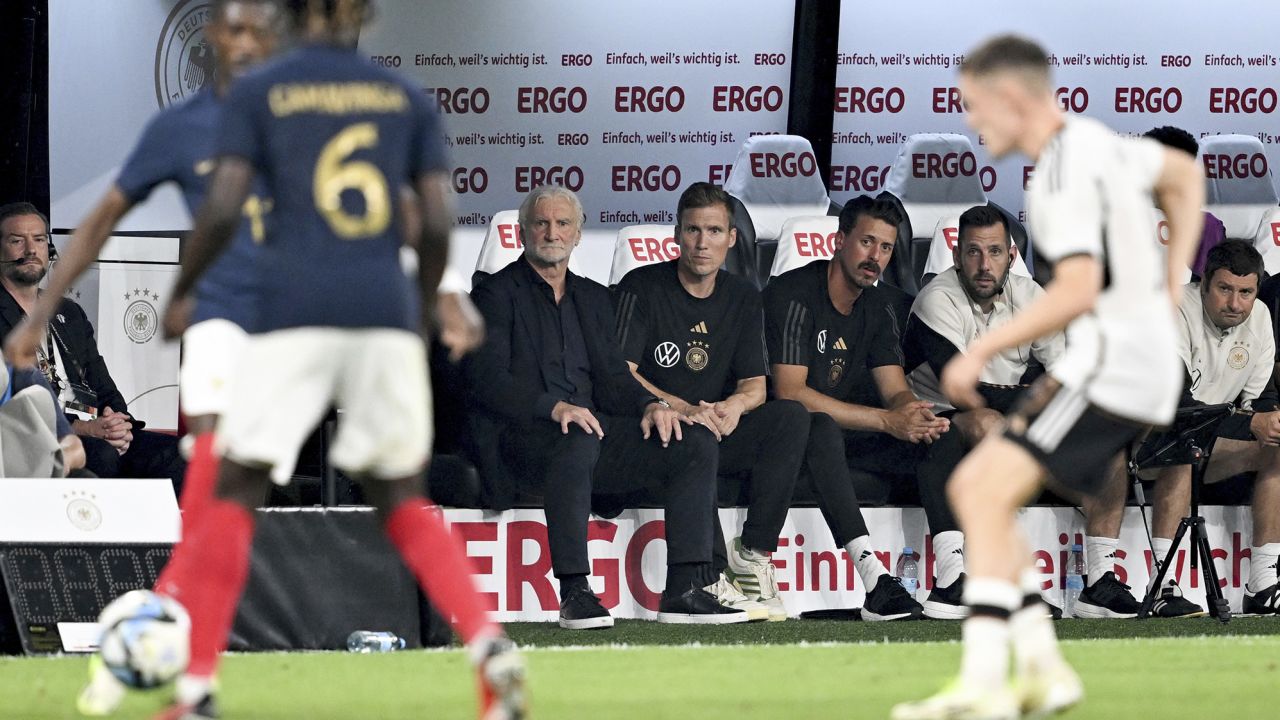 12 September 2023, North Rhine-Westphalia, Dortmund: Soccer: Internationals, Germany - France, Signal Iduna Park. Interim team manager Rudi V'ller (l) and his two assistants Hannes Wolf (2nd from left) and Sandro Wagner (3rd from left) sit on the bench and follow the action. Photo by: David Inderlied/picture-alliance/dpa/AP Images