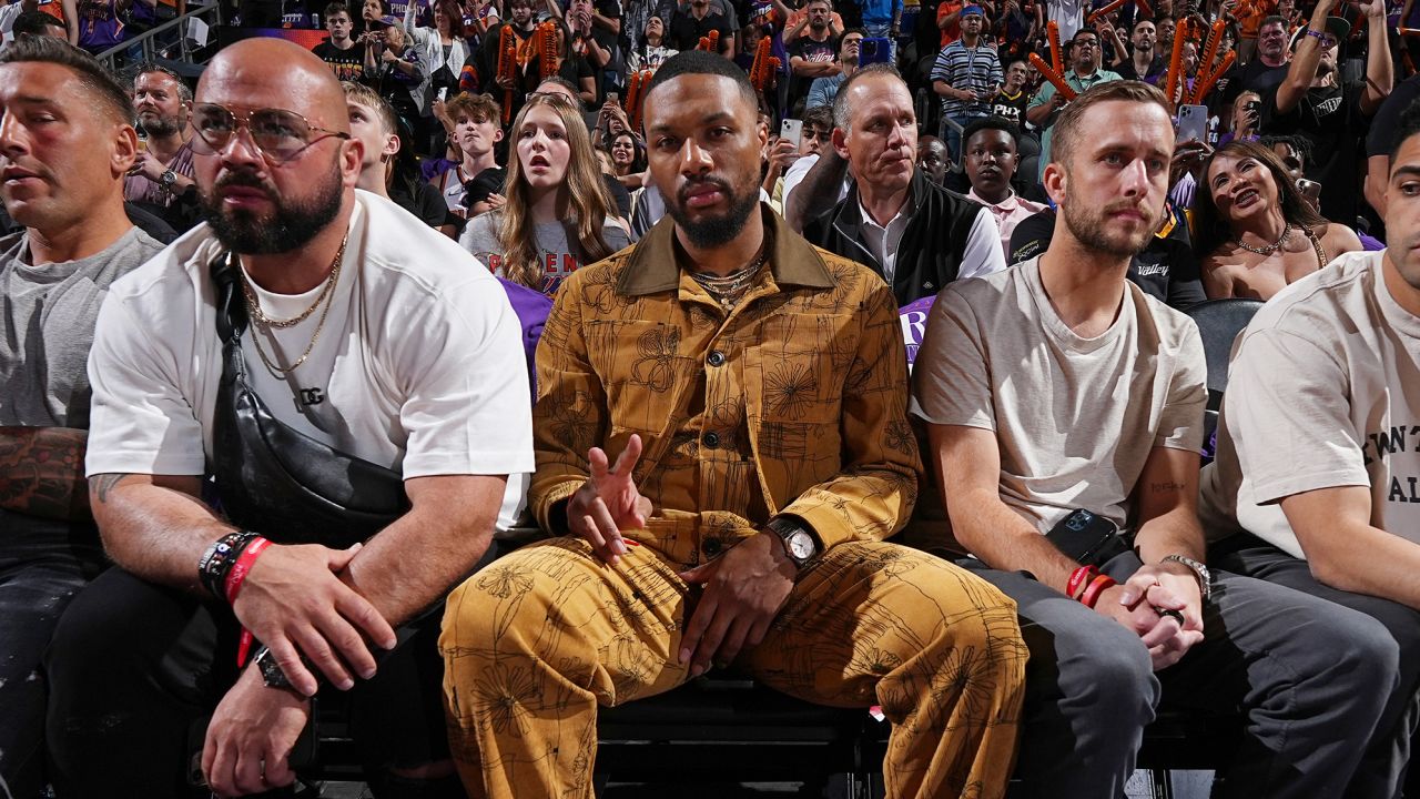 PHOENIX, AZ - MAY 5: Damian Lillard #0 of the Portland Trail Blazers attends Game Three of the Western Conference Semi-Finals of the 2023 NBA Playoffs between the Denver Nuggets and the Phoenix Suns on May 5, 2023 at Footprint Center in Phoenix, Arizona. NOTE TO USER: User expressly acknowledges and agrees that, by downloading and or using this photograph, user is consenting to the terms and conditions of the Getty Images License Agreement. Mandatory Copyright Notice: Copyright 2023 NBAE (Photo by Garrett Ellwood/NBAE via Getty Images)