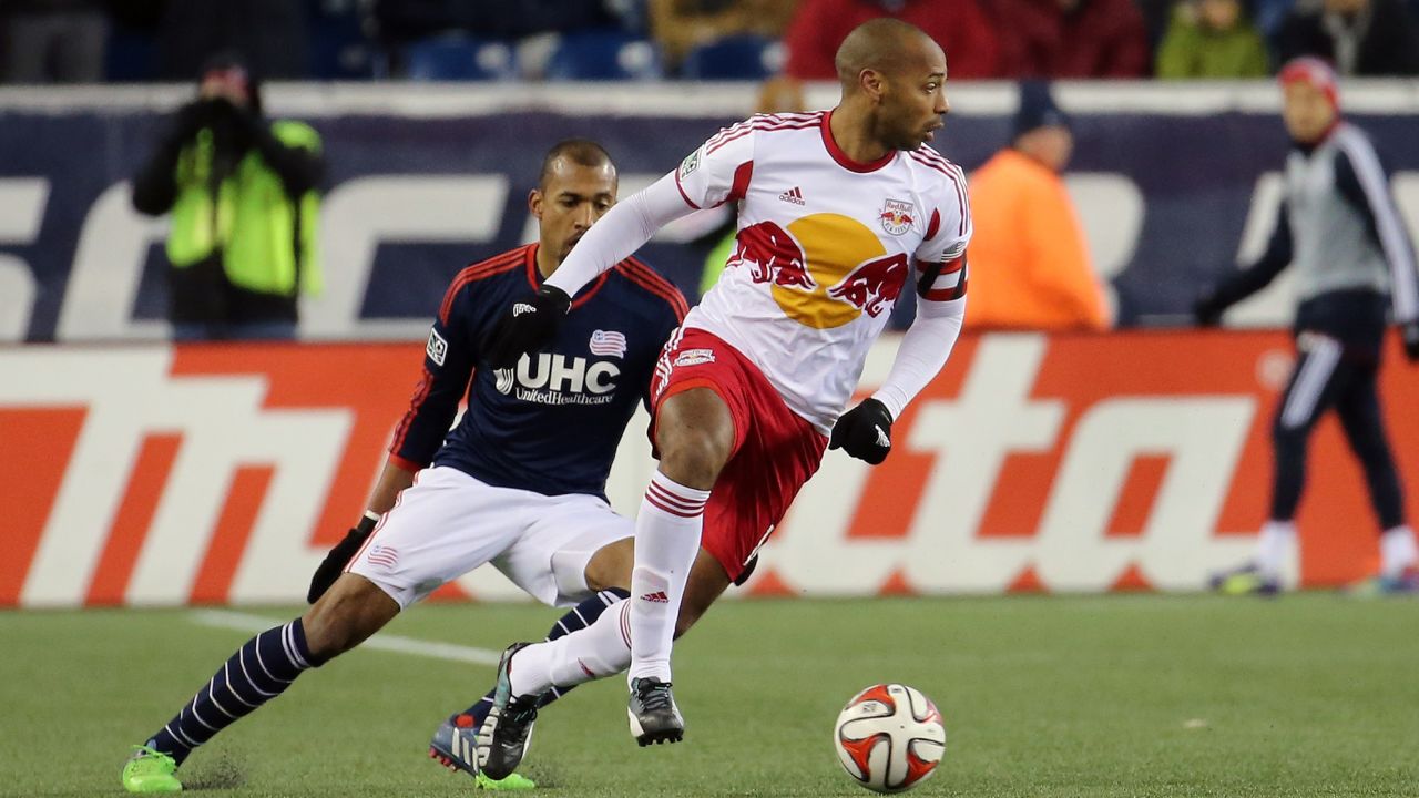 November 29, 2014: New York Red Bulls' Thierry Henry (14) cuts away from New England Revolution's Teal Bunbury (10). The New York Red Bulls and the New England Revolution played to a 2-2 draw in the second leg of the Eastern Conference Finals at Gillette Stadium in Foxborough, MA. New England wins the Eastern Conference Championship and advances to MLS Cup 4-3 on aggregate.  (Icon Sportswire via AP Images)