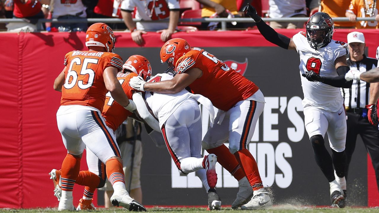 TAMPA, FLORIDA - SEPTEMBER 17: Joe Tryon-Shoyinka #9 of the Tampa Bay Buccaneers reacts as Shaquil Barrett #7 of the Tampa Bay Buccaneers returns an interception for a touchdown  during the fourth quarter against the Chicago Bears at Raymond James Stadium on September 17, 2023 in Tampa, Florida. (Photo by Mike Ehrmann/Getty Images)