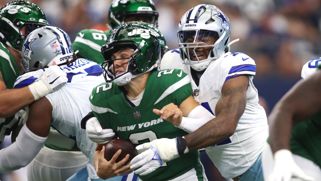 Sep 17, 2023; Arlington, Texas, USA; New York Jets quarterback Zach Wilson (2) is sacked by Dallas Cowboys linebacker Micah Parsons (11) in the first quarter at AT&T Stadium. Mandatory Credit: Tim Heitman-USA TODAY Sports