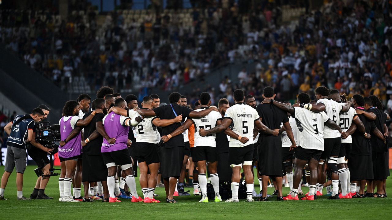 Fiji's players form a circle at the end of the France 2023 Rugby World Cup Pool C match between Australia and Fiji at Stade Geoffroy-Guichard in Saint-Etienne, south-eastern France on September 17, 2023. (Photo by Olivier CHASSIGNOLE / AFP) (Photo by OLIVIER CHASSIGNOLE/AFP via Getty Images)