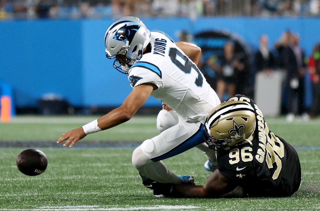 CHARLOTTE, NORTH CAROLINA - SEPTEMBER 18: Carl Granderson #96 of the New Orleans Saints sacks Bryce Young #9 of the Carolina Panthers during the second quarter in the game at Bank of America Stadium on September 18, 2023 in Charlotte, North Carolina. (Photo by Jared C. Tilton/Getty Images)