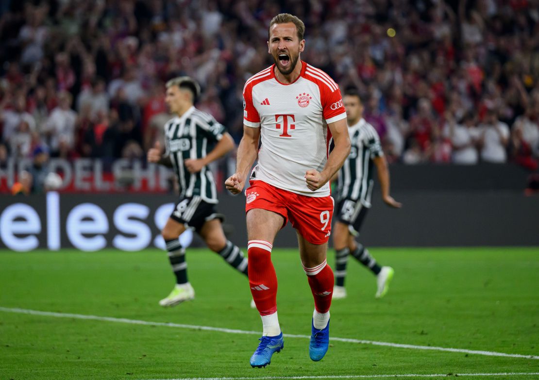 MUNICH, GERMANY - SEPTEMBER 20: Harry Kane of Bayern Munich celebrates after scoring their sides third goal from the penalty spot during the UEFA Champions League match between FC Bayern München and Manchester United at Allianz Arena on September 20, 2023 in Munich, Germany. (Photo by Matthias Hangst/Getty Images)