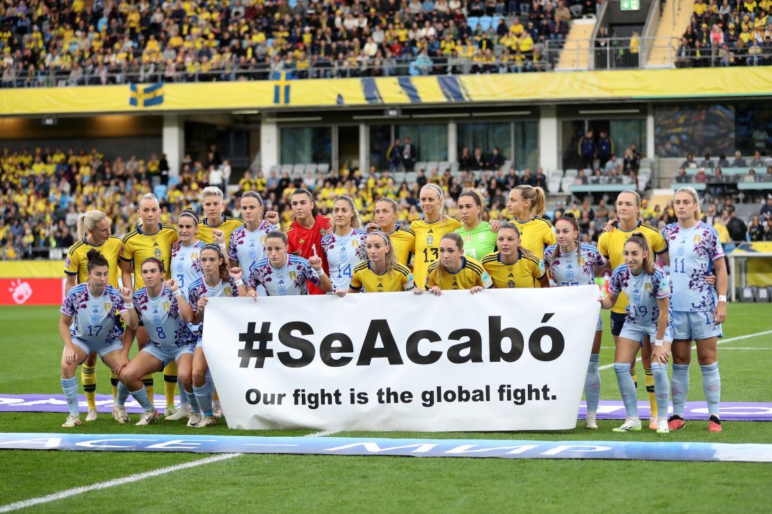 Spain and Sweden players join together for a protest before their match earier this month.