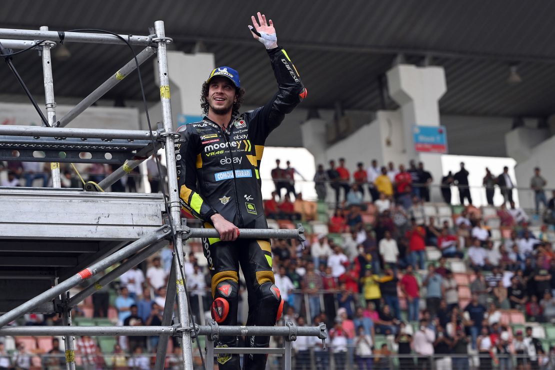 Bezzecchi waves to spectators after the Indian MotoGP Grand Prix.