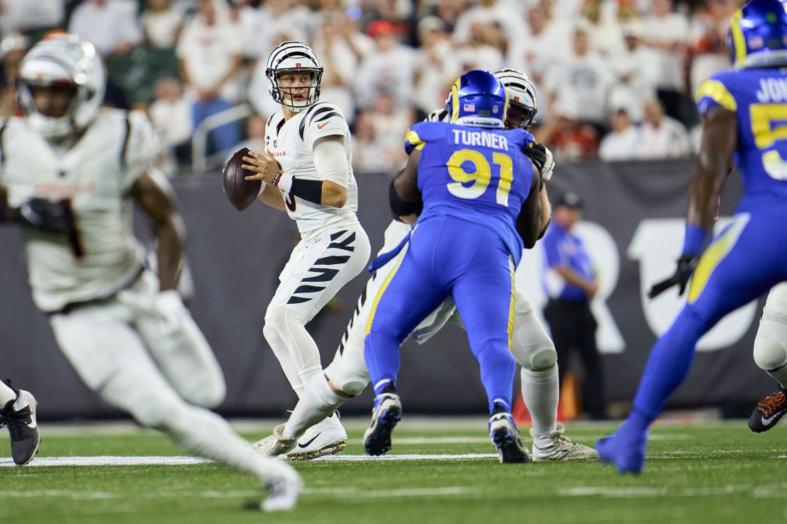 CINCINNATI, OH - SEPTEMBER 25: Joe Burrow #9 of the Cincinnati Bengals drops back to pass against the Los Angeles Rams during the first half at Paycor Stadium on September 25, 2023 in Cincinnati, Ohio. (Photo by Cooper Neill/Getty Images)