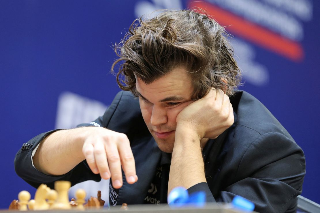 Chess - FIDE World Rapid and Blitz Championships 2022 - Blitz Open - Almaty, Kazakhstan - December 30, 2022. Magnus Carlsen of Norway makes a move during a game. REUTERS/Pavel Mikheyev