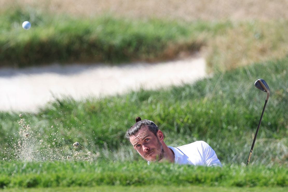 ROME, ITALY - SEPTEMBER 27: Former footballer, Gareth Bale plays his third shot on the first hole during the All-Star Match at the 2023 Ryder Cup at Marco Simone Golf Club on September 27, 2023 in Rome, Italy. (Photo by Jamie Squire/Getty Images)