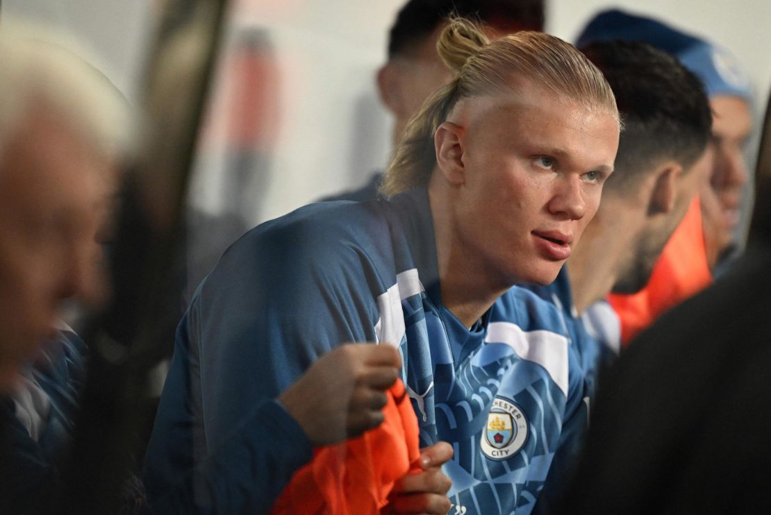 Manchester City's Norwegian striker #09 Erling Haaland sits on the bench during the English League Cup third round football match between Newcastle United and Manchester City at St James' Park in Newcastle-upon-Tyne, north east England on September 27, 2023. (Photo by Oli SCARFF / AFP) / RESTRICTED TO EDITORIAL USE. No use with unauthorized audio, video, data, fixture lists, club/league logos or 'live' services. Online in-match use limited to 120 images. An additional 40 images may be used in extra time. No video emulation. Social media in-match use limited to 120 images. An additional 40 images may be used in extra time. No use in betting publications, games or single club/league/player publications. /  (Photo by OLI SCARFF/AFP via Getty Images)