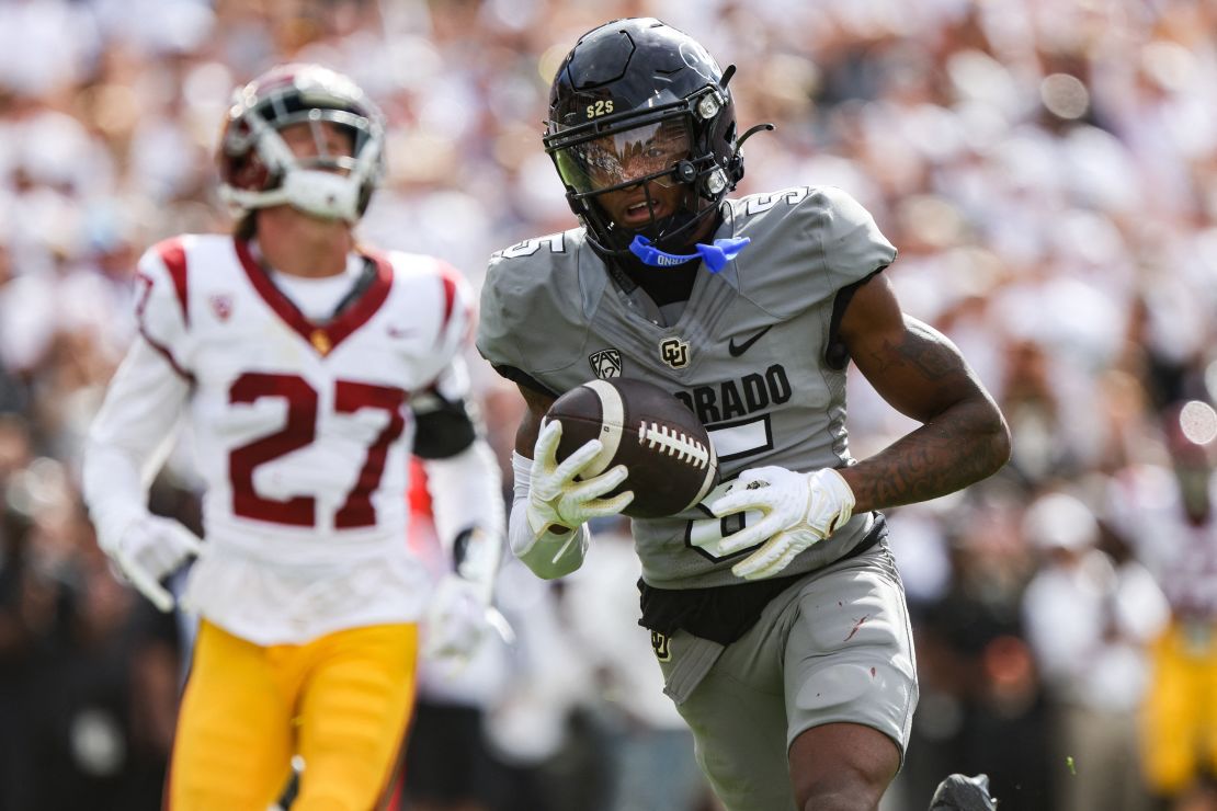 Sep 30, 2023; Boulder, Colorado, USA; Colorado Buffaloes wide receiver Jimmy Horn Jr. (5) runs the ball in for a touchdown in the second quarter of the game against the USC Trojans at Folsom Field.