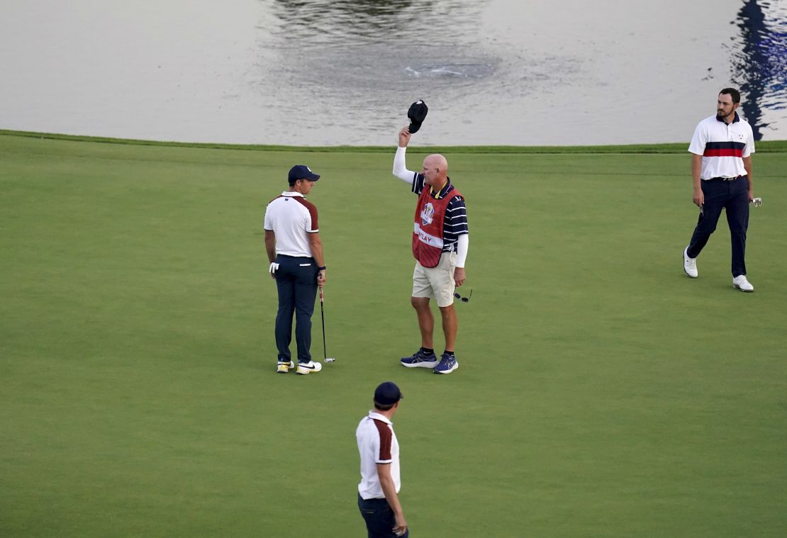 Team Europe's Rory McIlroy argues with Joe LaCava, caddie of USA's Patrick Cantlay on the 18th during the fourballs on day two of the 44th Ryder Cup at the Marco Simone Golf and Country Club, Rome, Italy. Picture date: Saturday September 30, 2023. (Photo by Zac Goodwin/PA Images via Getty Images)