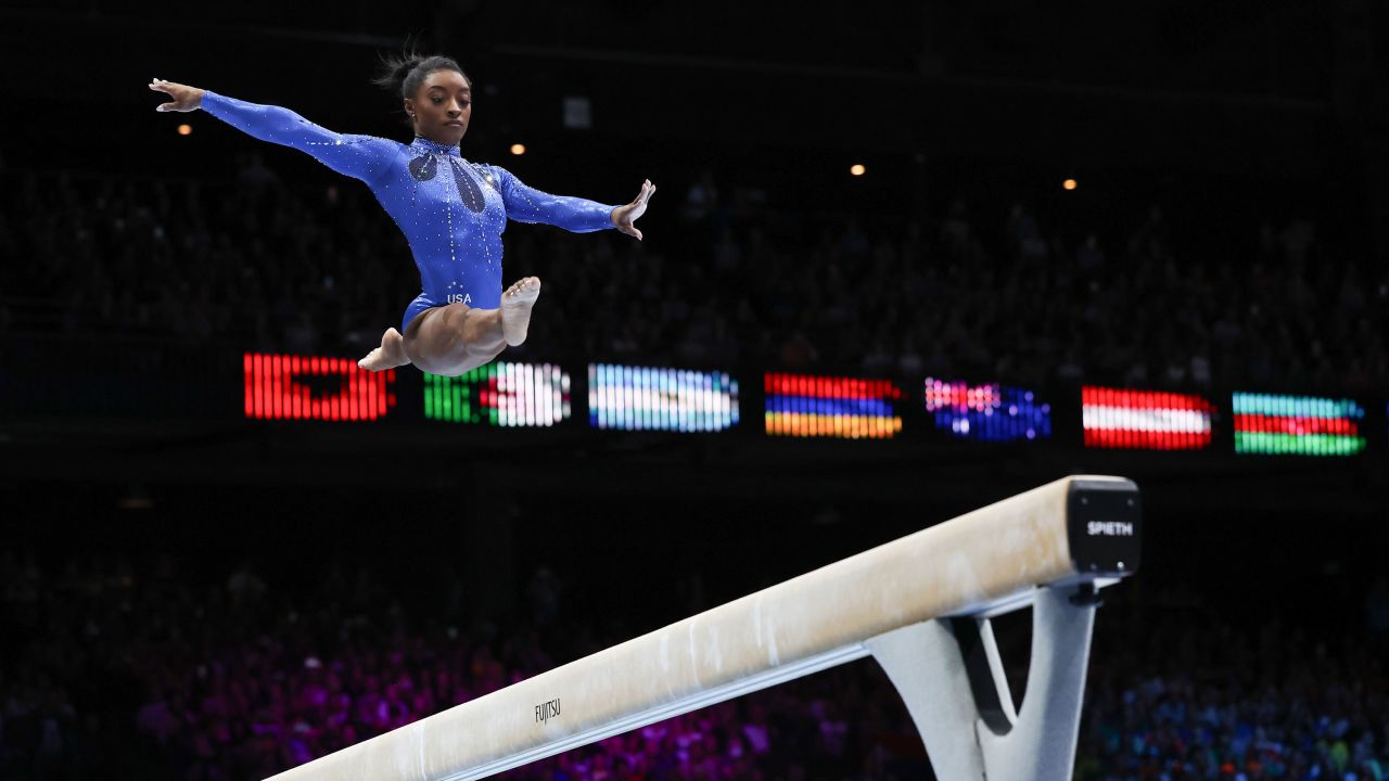 United States' Simone Biles competes on the beam during the women's all-round final at the Artistic Gymnastics World Championships in Antwerp, Belgium, Friday, Oct. 6, 2023. (AP Photo/Geert vanden Wijngaert)