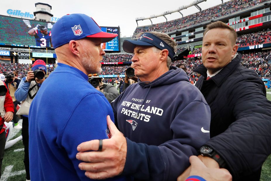 New England Patriots head coach Bill Belichick, right, embraces Buffalo Bills head coach Sean McDermott after the Patriots beat the Bills 29-25 on October 22.