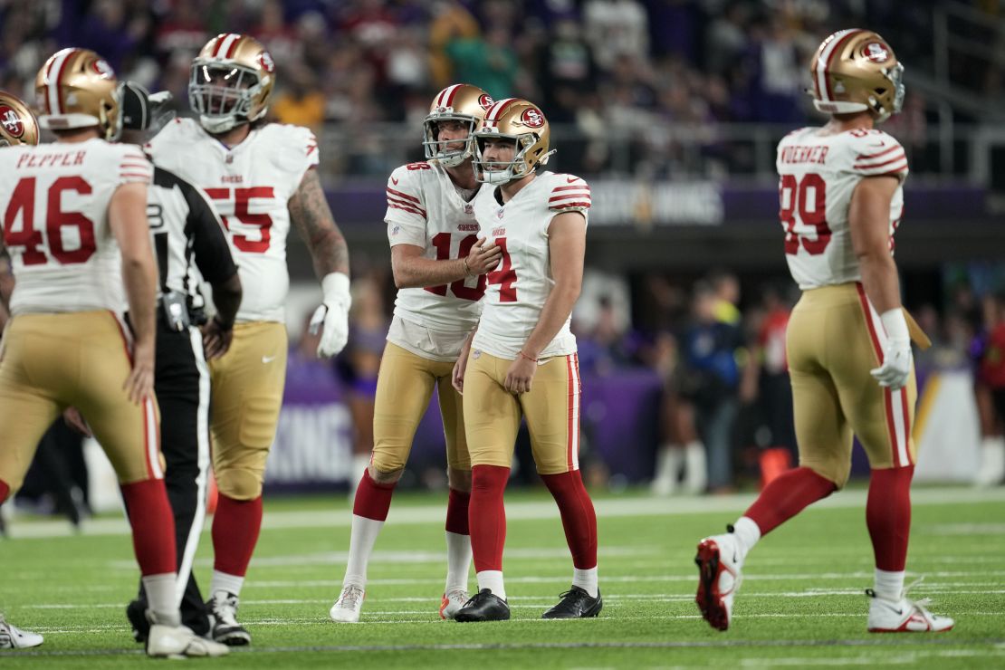 San Francisco 49ers place-kicker Jake Moody (4) reacts with teammates after missing a field goal during the first half of an NFL football game against the Minnesota Vikings, Monday, Oct. 23, 2023, in Minneapolis. (AP Photo/Abbie Parr)