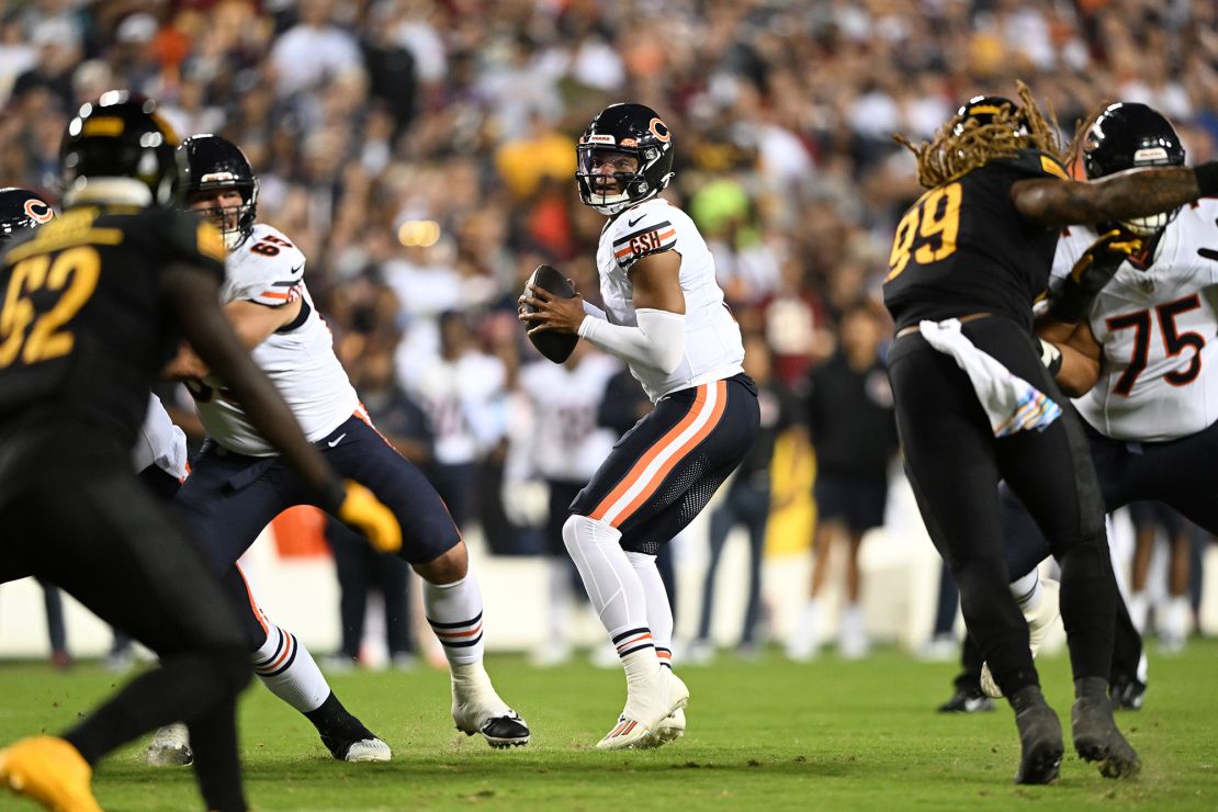 LANDOVER, MARYLAND - OCTOBER 05: Justin Fields #1 of the Chicago Bears looks to pass during the first half against the Washington Commanders at FedExField on October 05, 2023 in Landover, Maryland. (Photo by Greg Fiume/Getty Images)