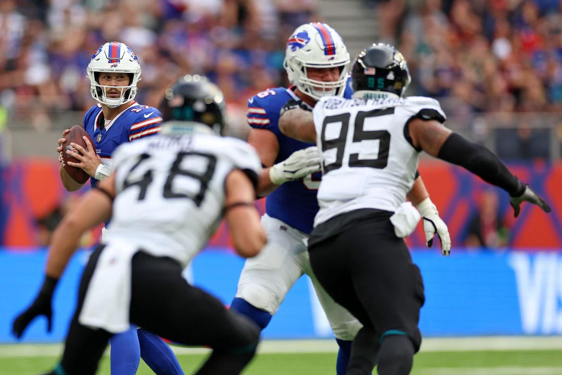 Buffalo Bills quarterback Josh Allen (17) looks to pass the ball during an NFL football game between Jacksonville Jaguars and Buffalo Bills at the Tottenham Hotspur stadium in London, Sunday, Oct. 8, 2023. (AP Photo/Ian Walton)