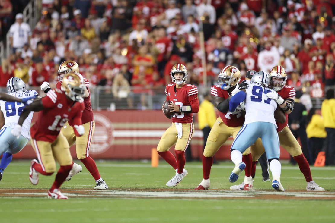 SANTA CLARA, CALIFORNIA - OCTOBER 08: Brock Purdy #13 of the San Francisco 49ers looks to pass during the third quarter against the Dallas Cowboys at Levi's Stadium on October 08, 2023 in Santa Clara, California. (Photo by Ezra Shaw/Getty Images)