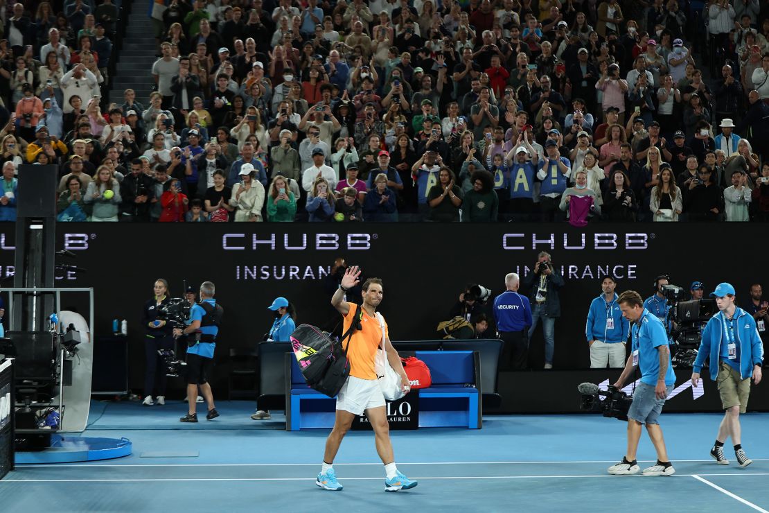 MELBOURNE, AUSTRALIA - JANUARY 18: Rafael Nadal of Spain acknowledges the crowd after losing their round two singles match against Mackenzie McDonald of the United States during day three of the 2023 Australian Open at Melbourne Park on January 18, 2023 in Melbourne, Australia. (Photo by Cameron Spencer/Getty Images)