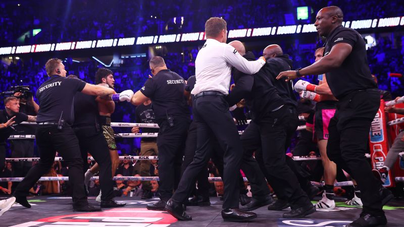 Logan Paul defeats Dillon Danis but security step into the ring as the bout ends in chaos