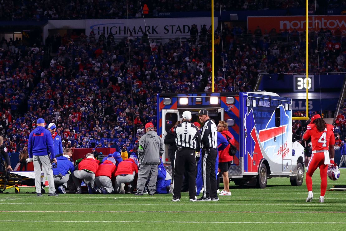 An ambulance waits on the field as medical staff attend to Buffalo Bills running back Damien Harris during the first half of an NFL football game against the New York Giants in Orchard Park, N.Y., Sunday Oct. 15, 2023. (AP Photo/ Jeffrey T. Barnes)